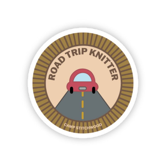 Camp Stitchwood Road Trip Knitter Sticker with a car on a road graphic