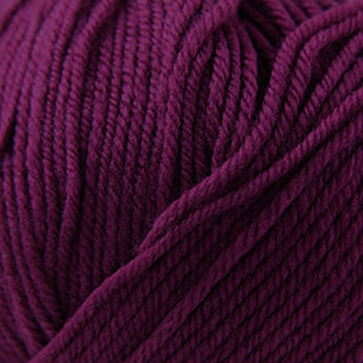 Cascade Yarns 220 Superwash wool in rich purple, perfect for knitting and crochet projects