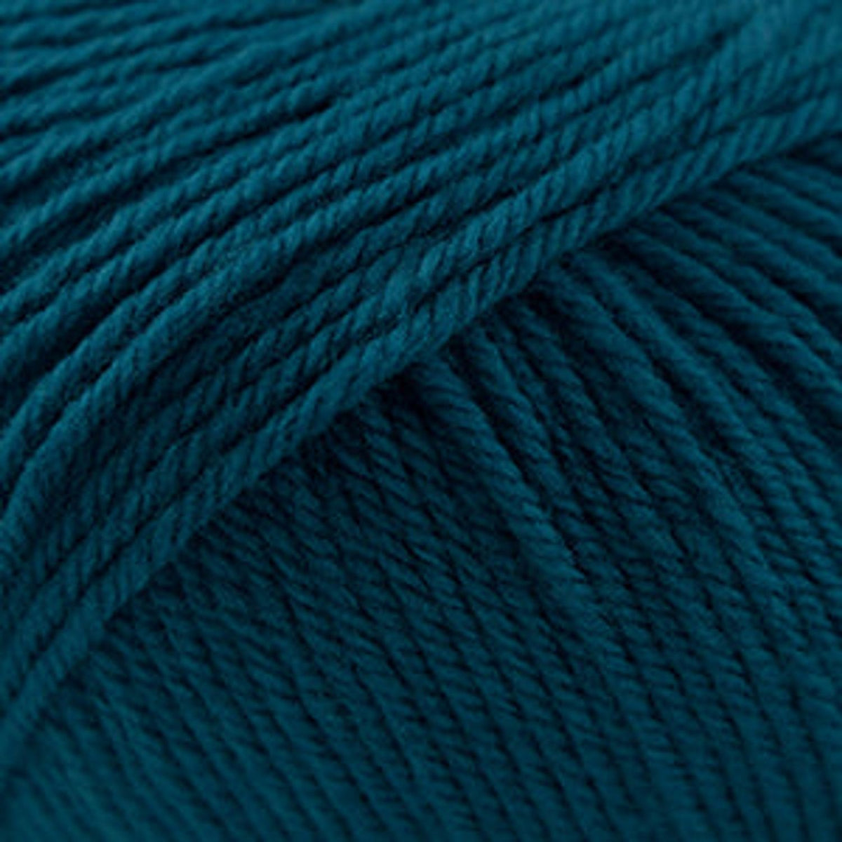 Cascade Yarns 220 Superwash wool in a rich teal color, perfect for versatile knitting projects
