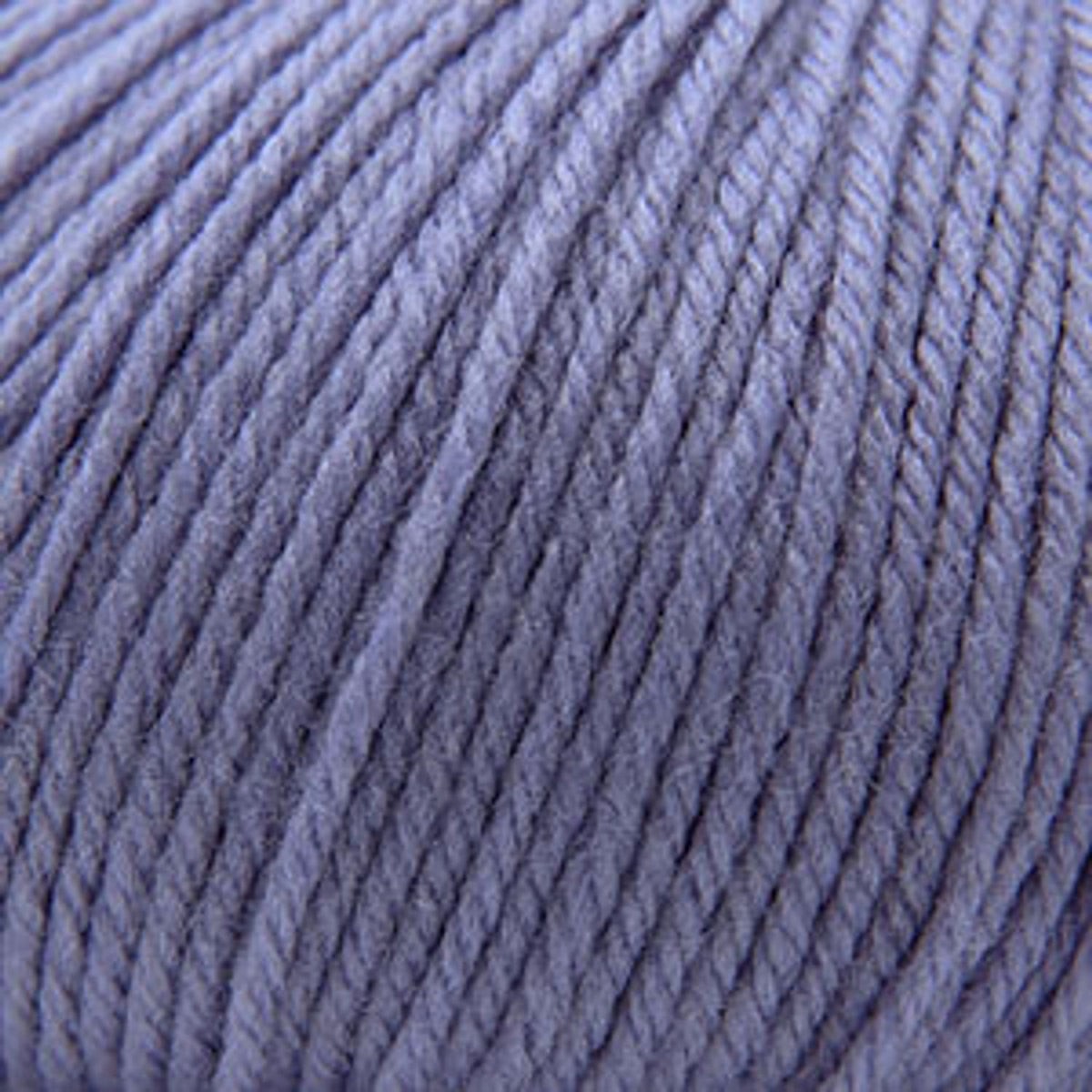 Cascade Yarns 220 Superwash wool in soft lavender hue, perfect for knitting and crocheting projects
