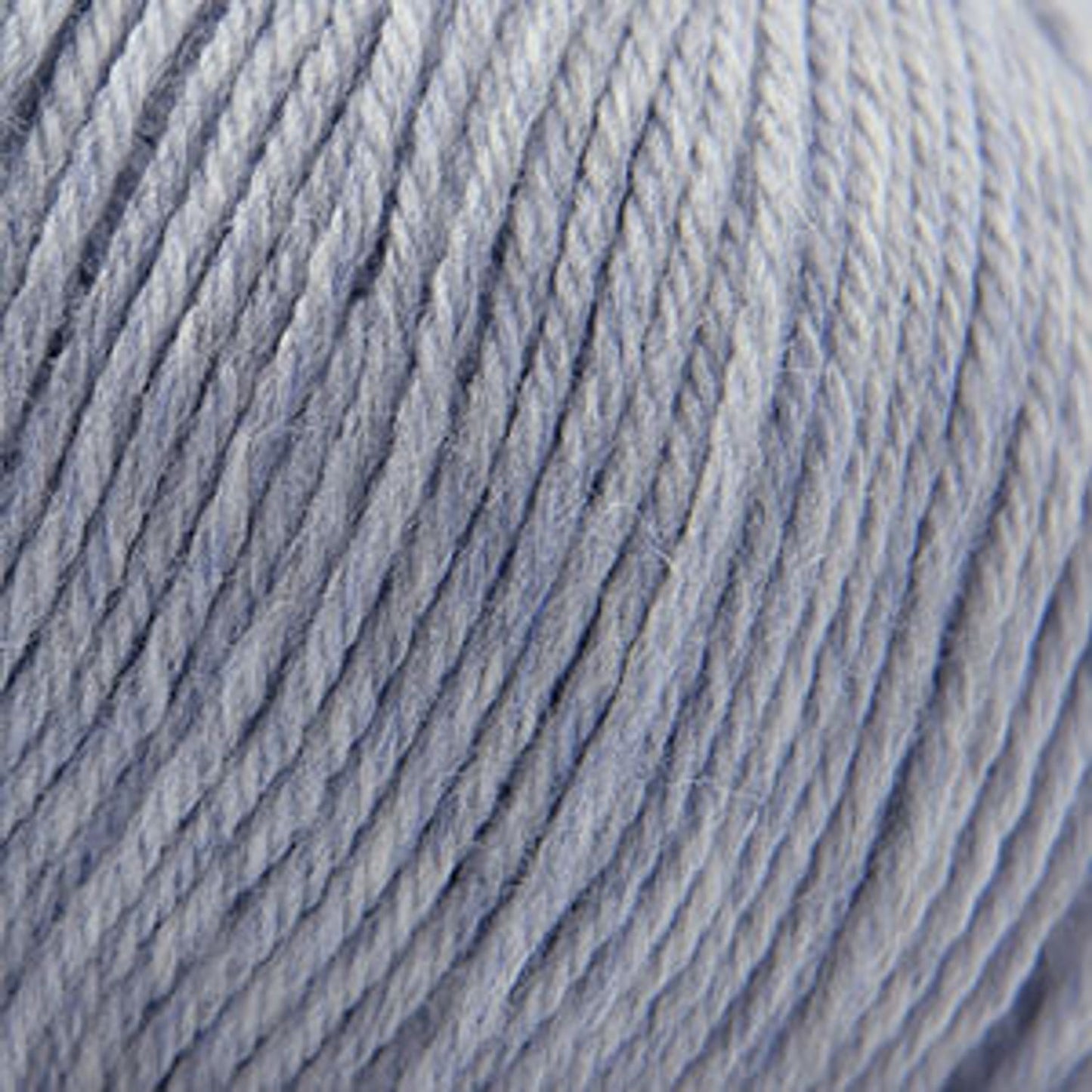 Cascade Yarns 220 Superwash wool in soft gray, perfect for versatile knitting and crochet projects