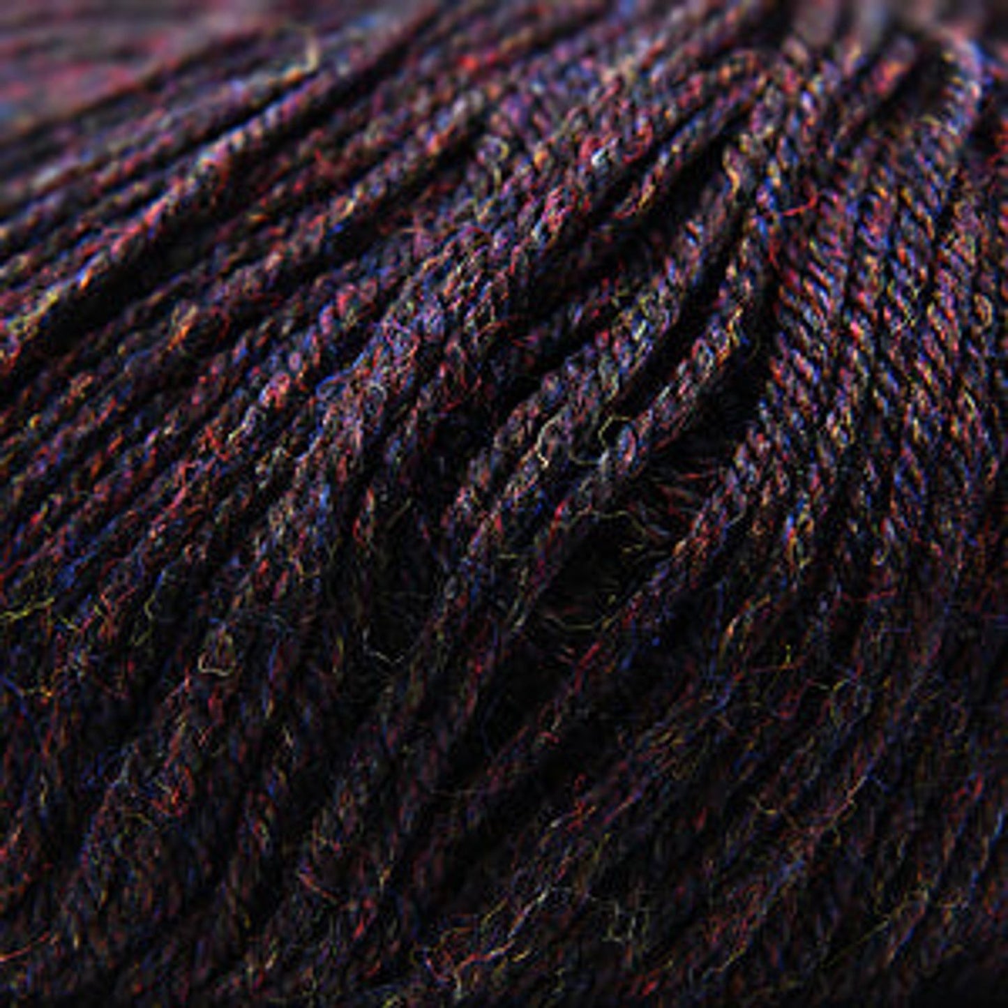 Cascade Yarns 220 Superwash wool in rich dark tones, perfect for versatile knitting projects