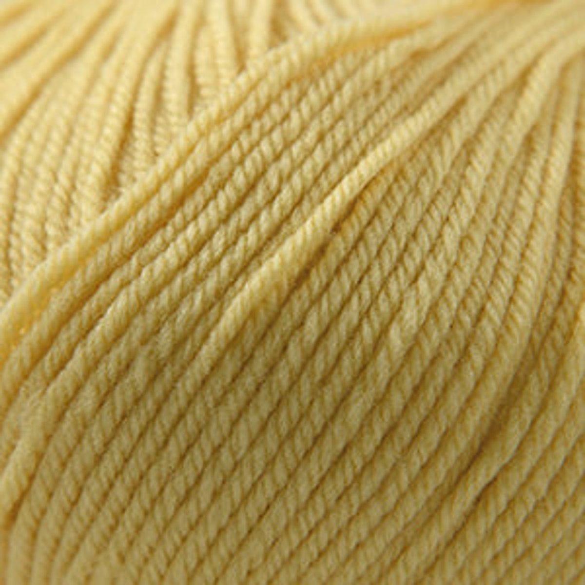 Cascade Yarns 220 Superwash wool in soft yellow, perfect for knitting and crochet projects