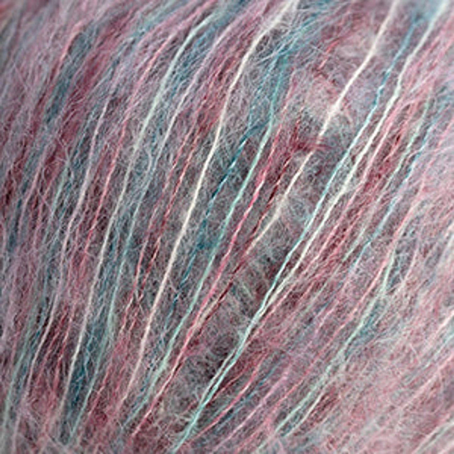 Cascade Yarns hand-painted yarn in soft pink and blue hues, perfect for creative knitting projects