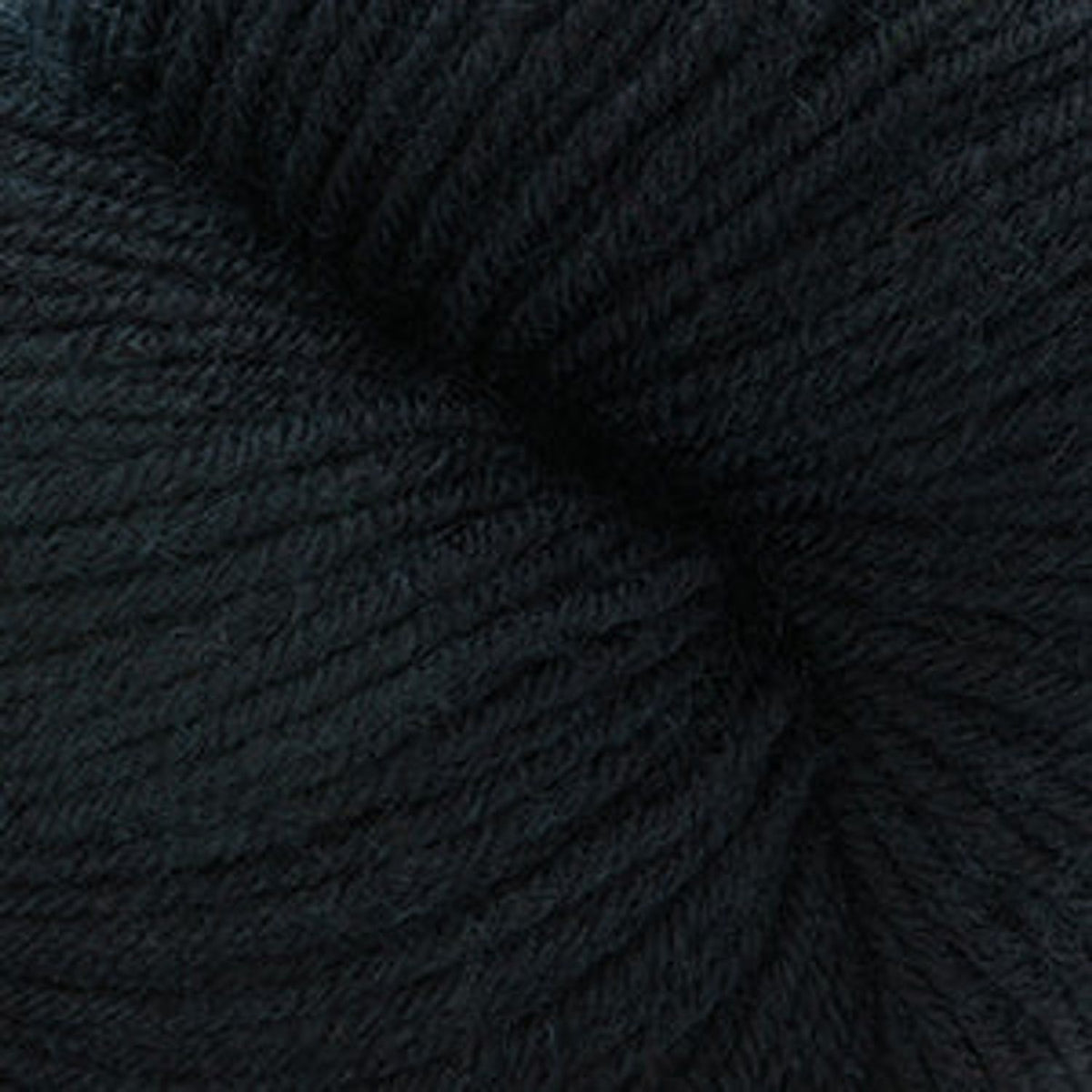Cascade Yarns Heritage superwash merino wool in deep black, perfect for cozy knitting projects