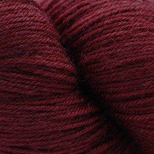 Cascade Yarns Heritage superwash merino wool in rich burgundy color for knitting and crocheting projects