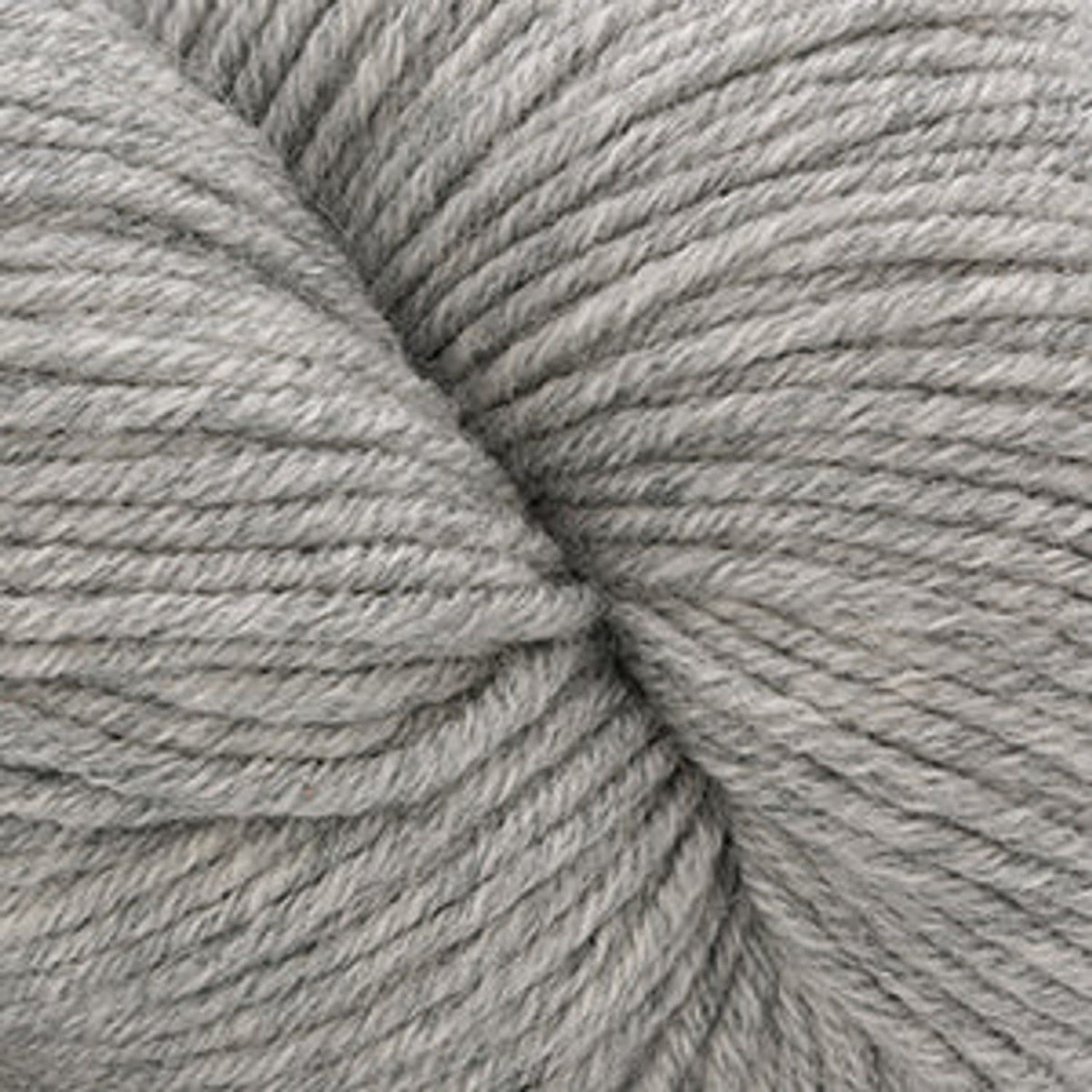 Cascade Yarns Heritage superwash merino wool in soft gray ideal for cozy knitwear projects