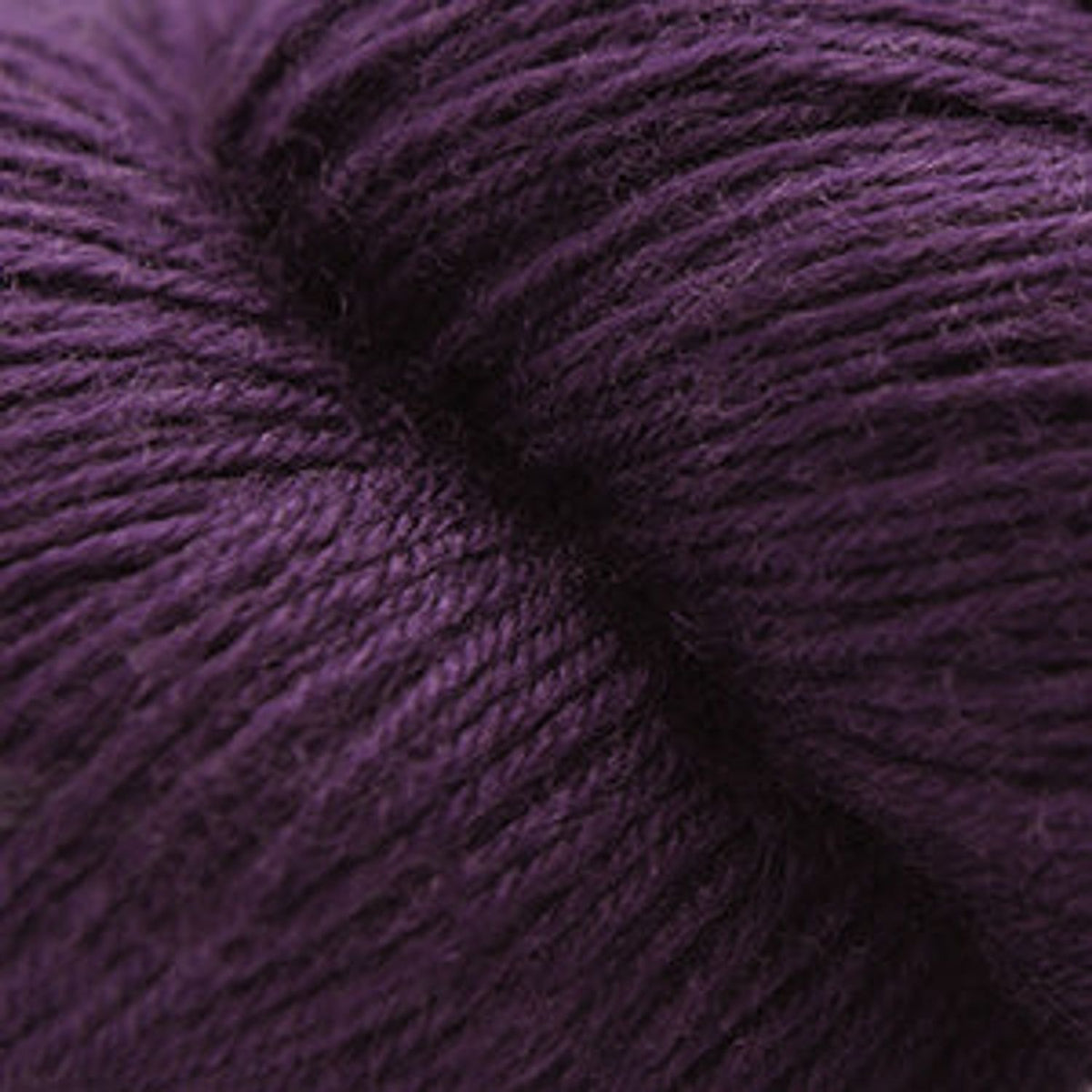 Cascade Yarns Heritage superwash merino wool in rich purple shade for knitting and crocheting projects