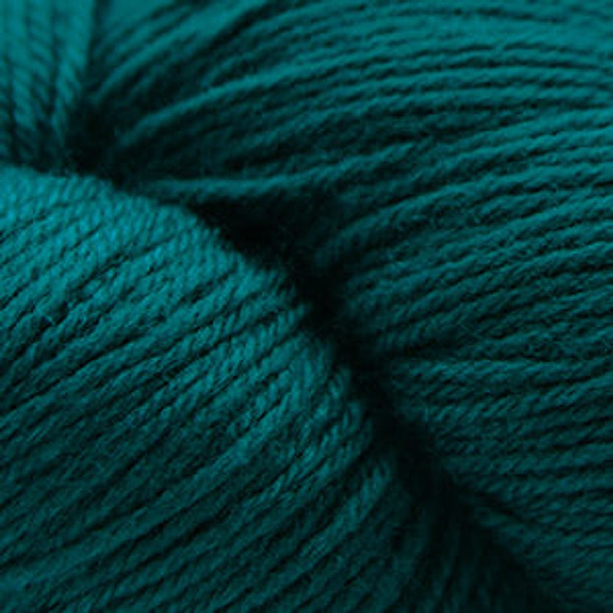 Teal Cascade Yarns Heritage superwash merino wool for soft and durable knitting projects