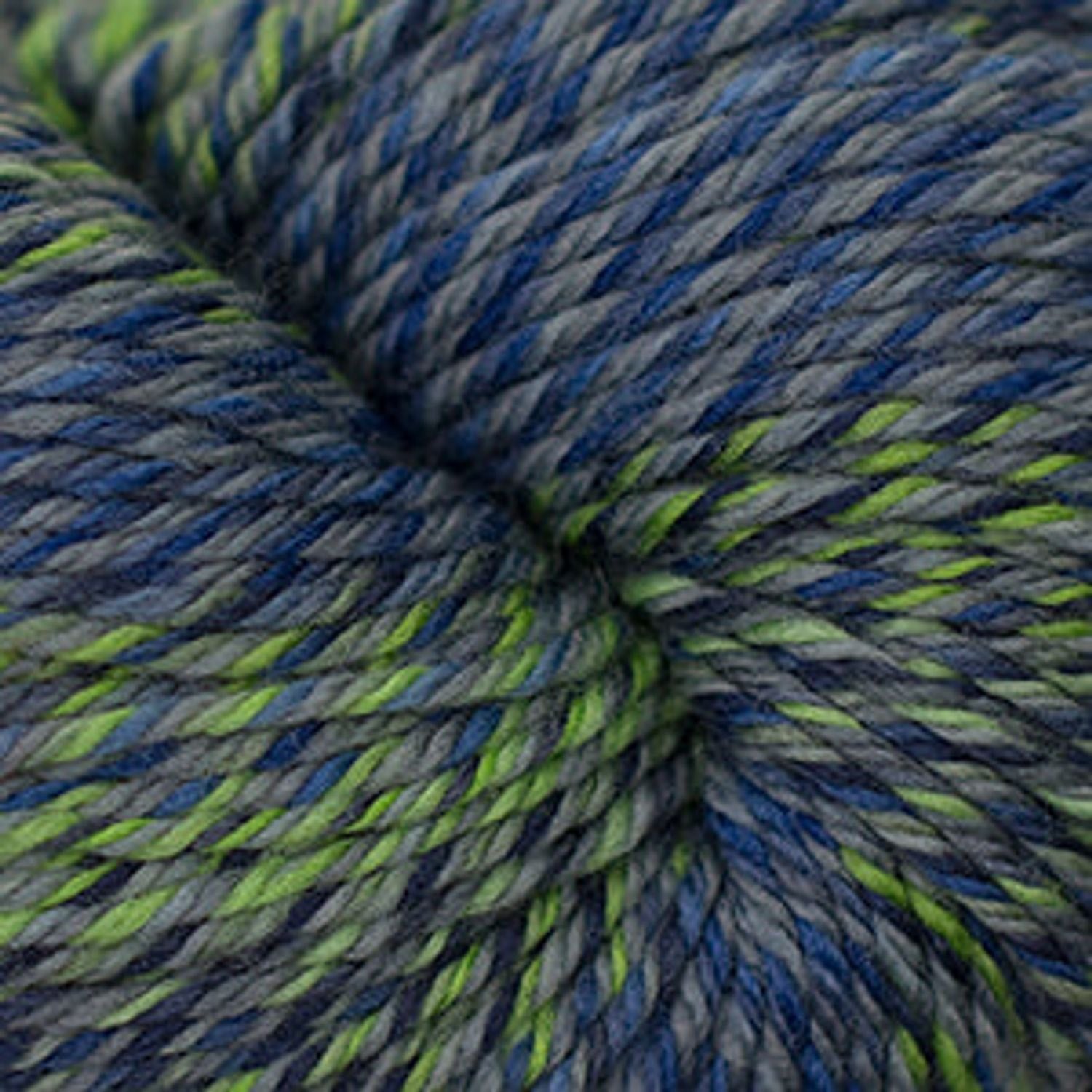 Cascade Yarns wholesale, multicolored yarn in shades of gray, blue, and green, perfect for knitting projects