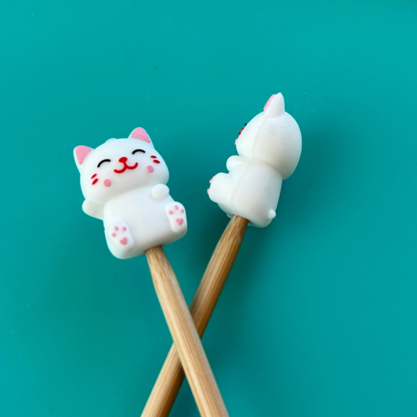 Cute cat-themed chopsticks with adorable cat character designs for playful dining