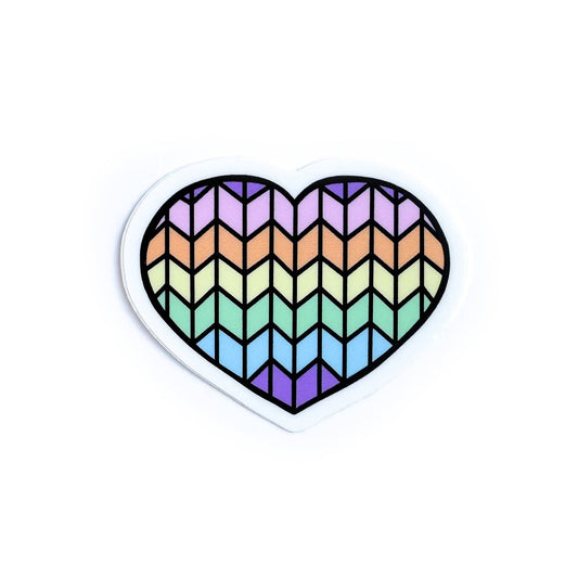 Colorful heart-shaped cat sticker featuring a zigzag pattern in pastel hues