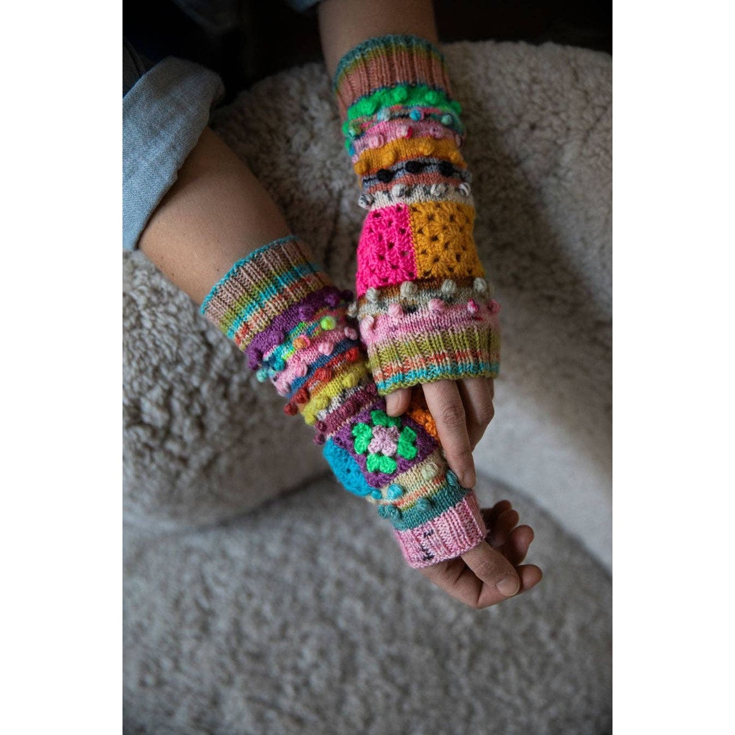 Colorful fingerless gloves featuring various patterns, ideal for chunky yarn crochet projects