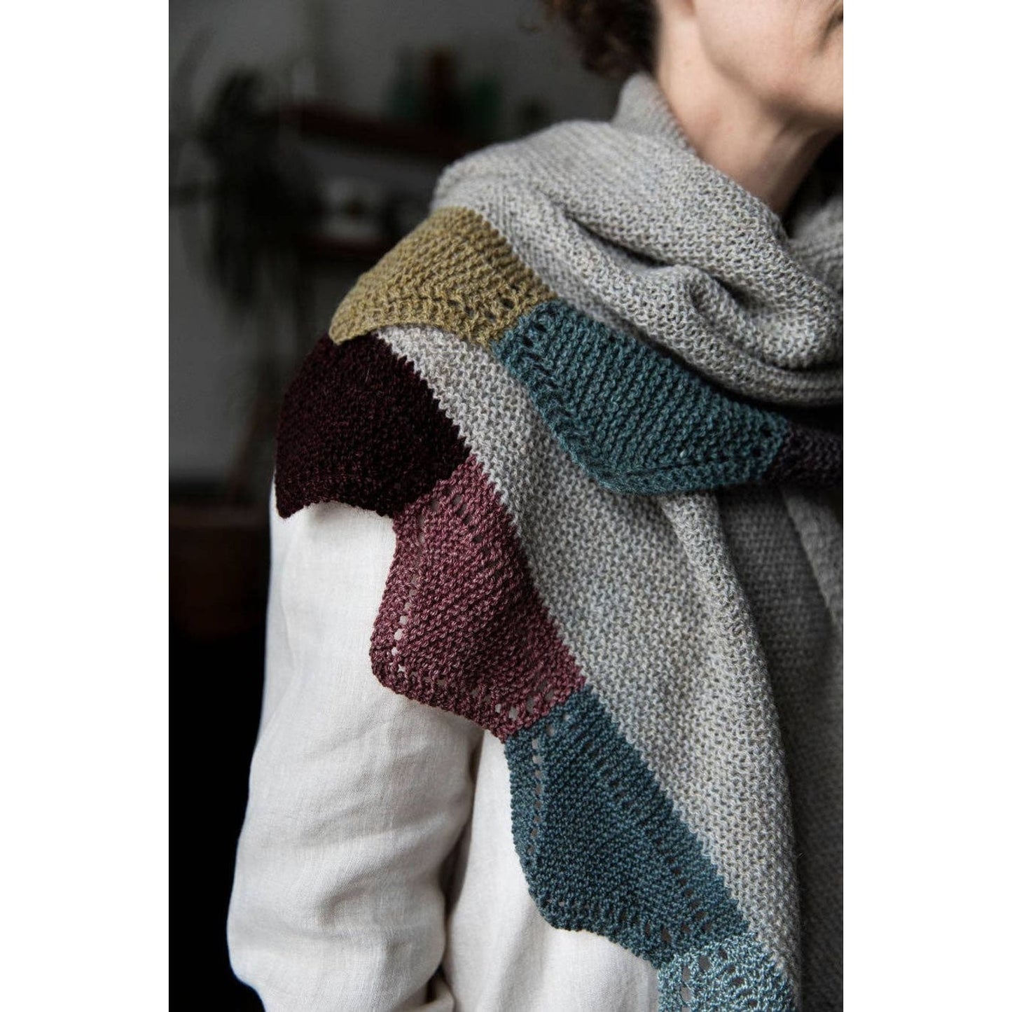 Stylish shawl designed for chunky yarn crochet projects featuring a modern patchwork design