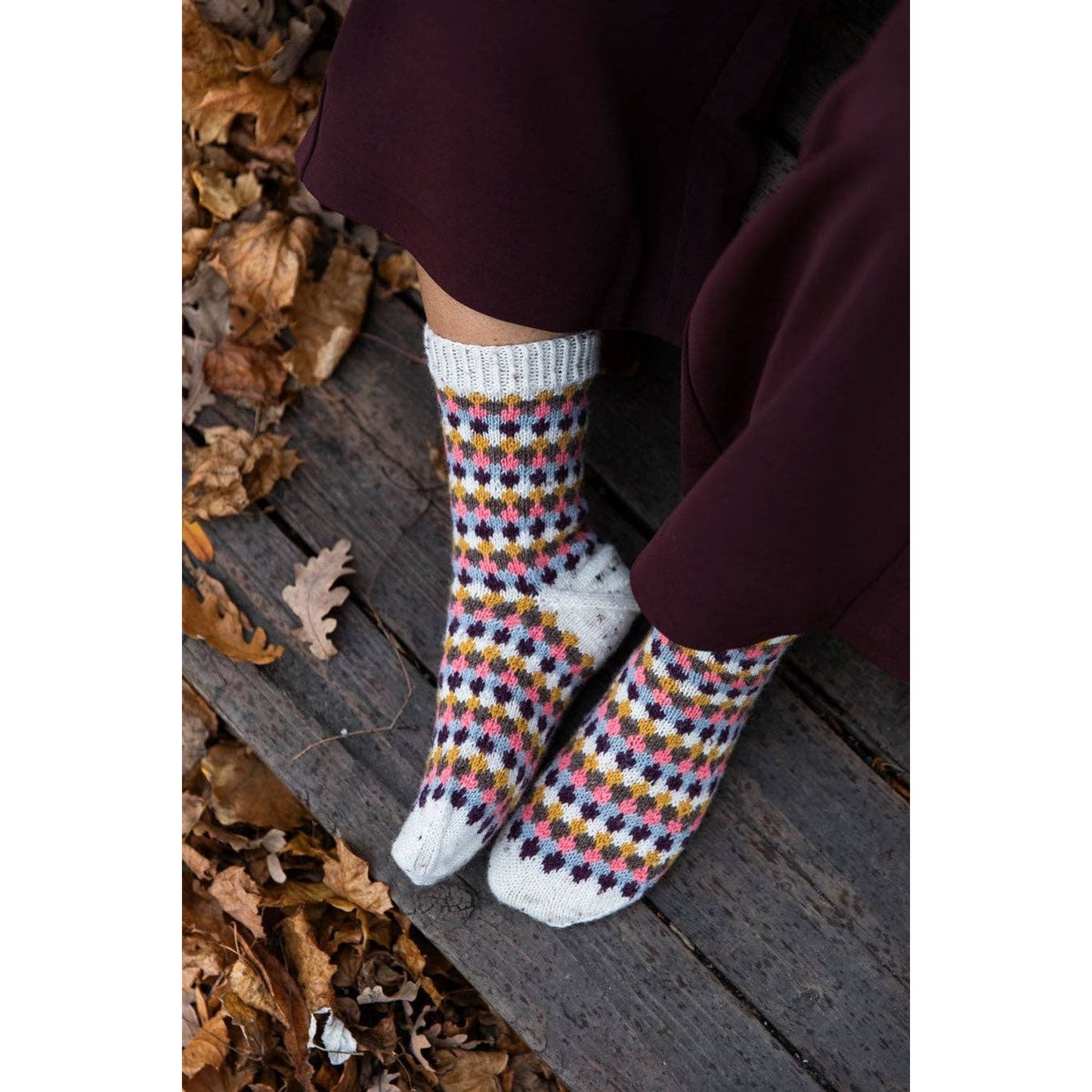 Cozy hand-crocheted socks featuring a colorful pattern for chunky yarn crochet projects