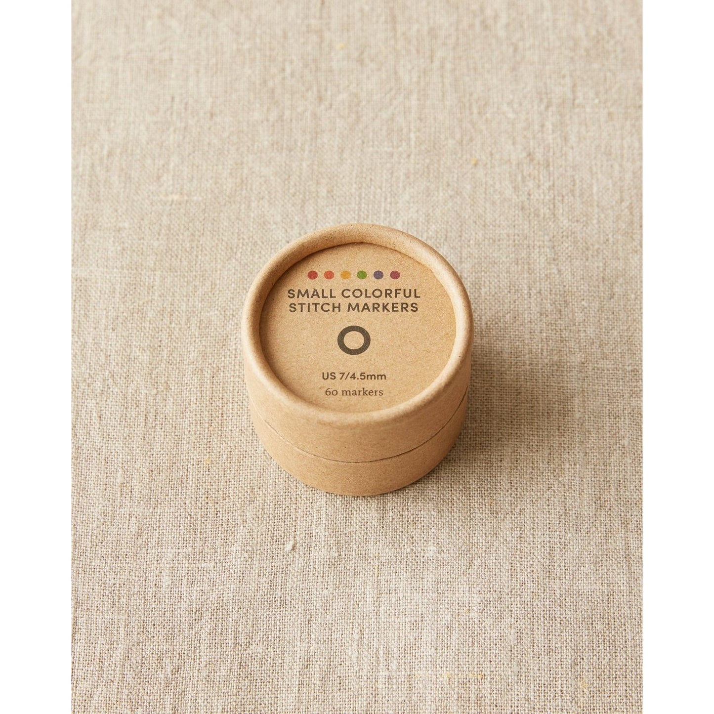 Cocoknits ring stitch markers in a round eco-friendly container with 60 colorful markers