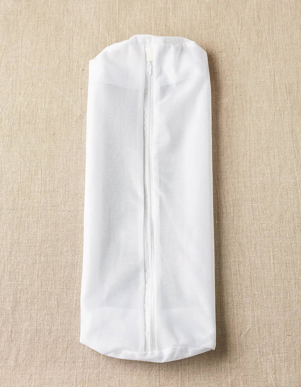 Cocoknits sweater care bag set in white, designed to protect and care for your knitted garments