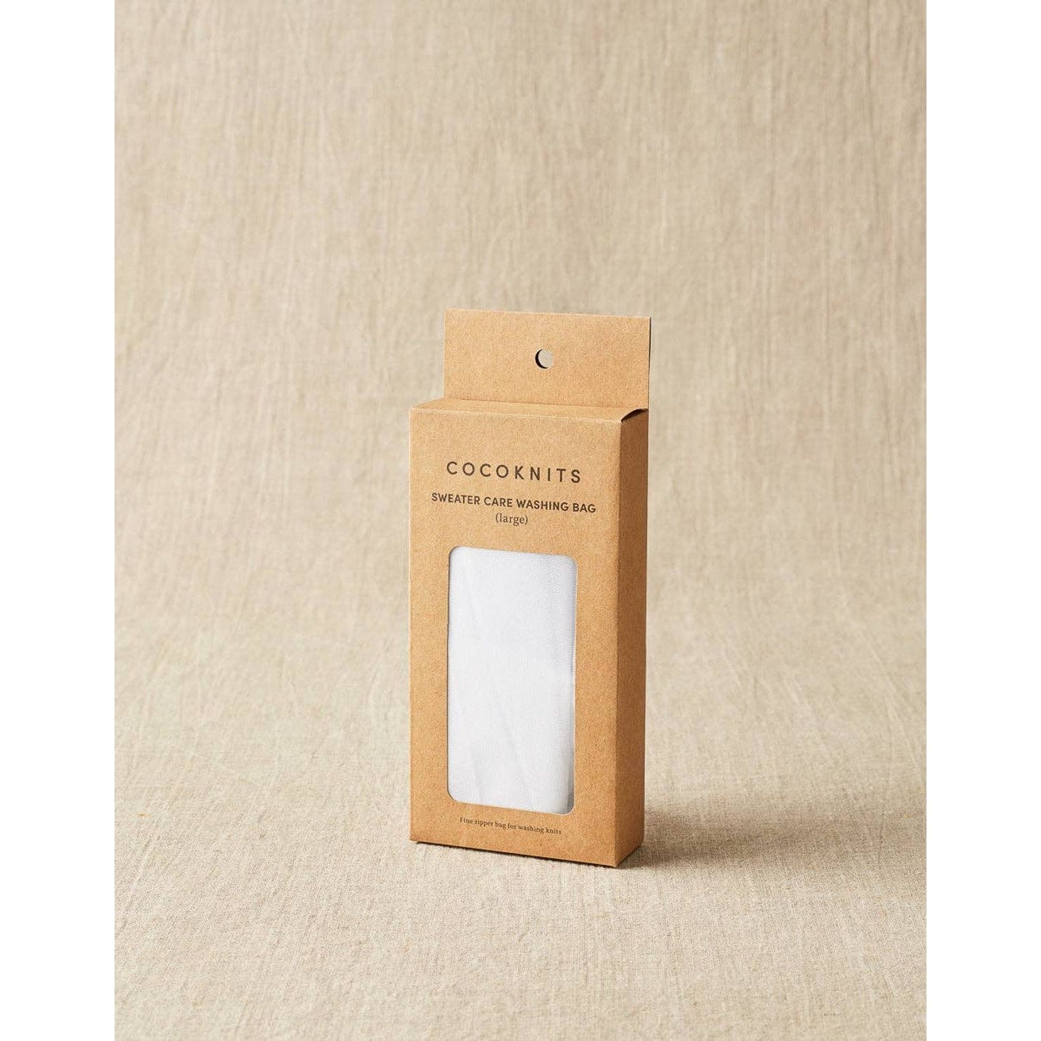 Cocoknits sweater care bag set in eco-friendly packaging for washing and storing sweaters