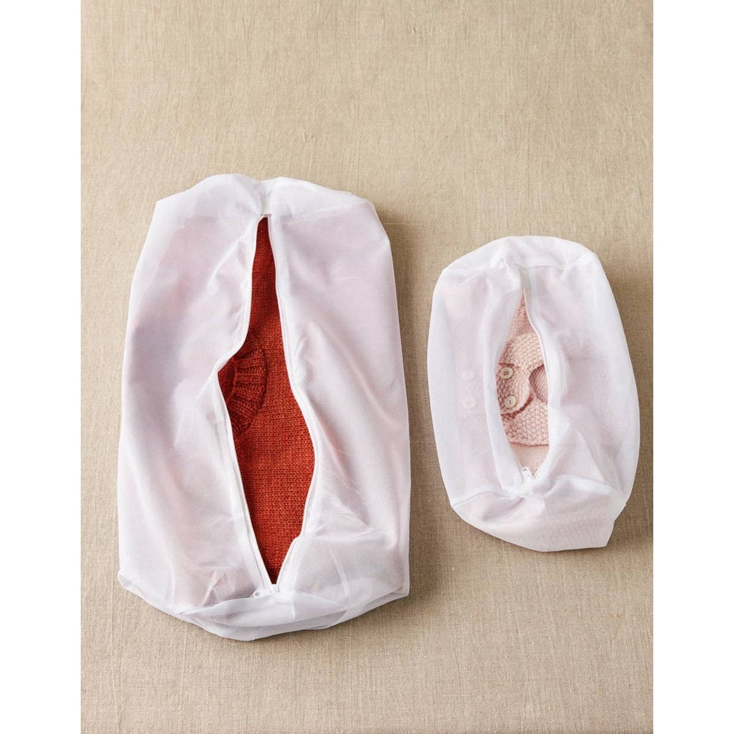 Cocoknits sweater care bag set featuring two breathable mesh bags for safe garment storage