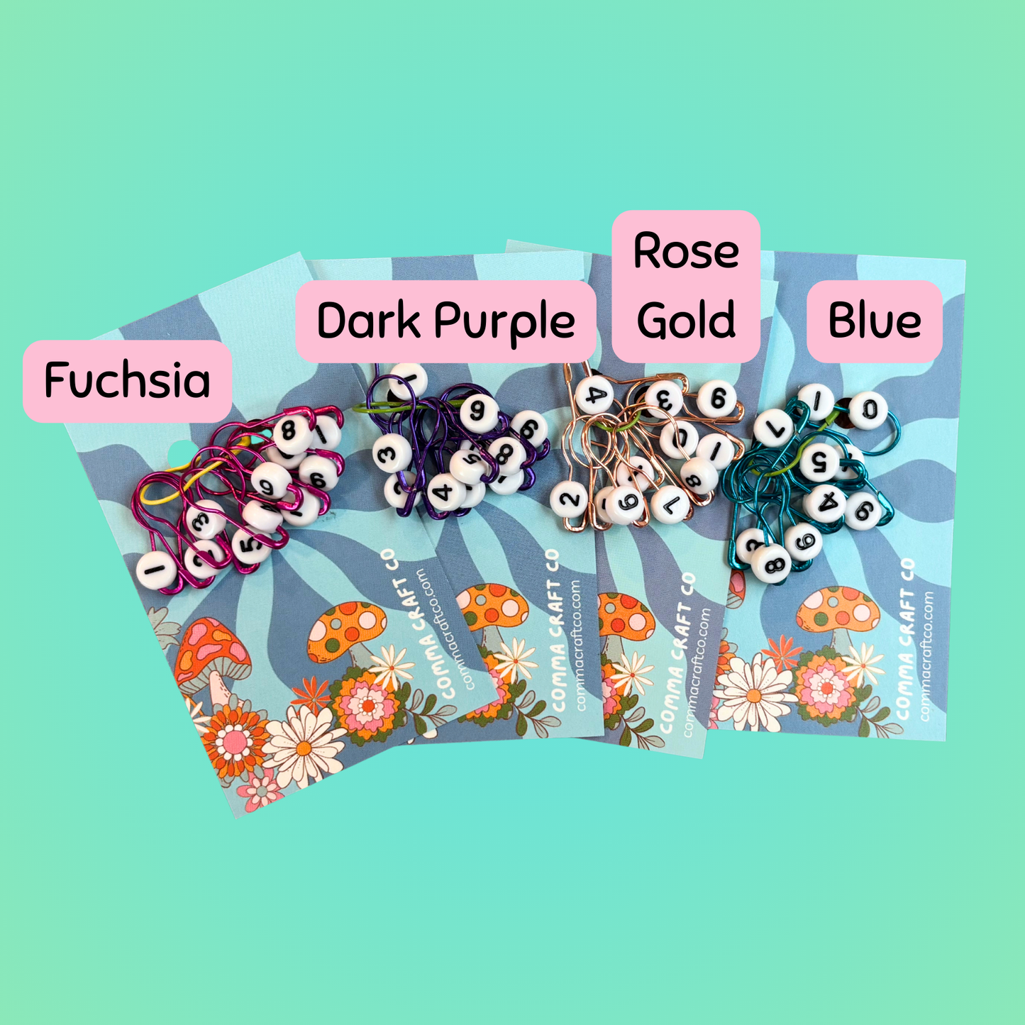 Comma Craft Co crochet markers stitch markers in Fuchsia, Dark Purple, Rose Gold, and Blue for easy knitting