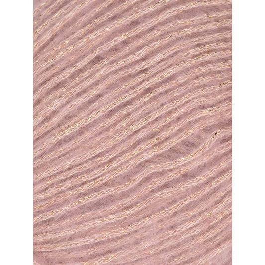 Soft pink Knitting Fever cotton and yarn with subtle shimmer for knitting and crafting projects