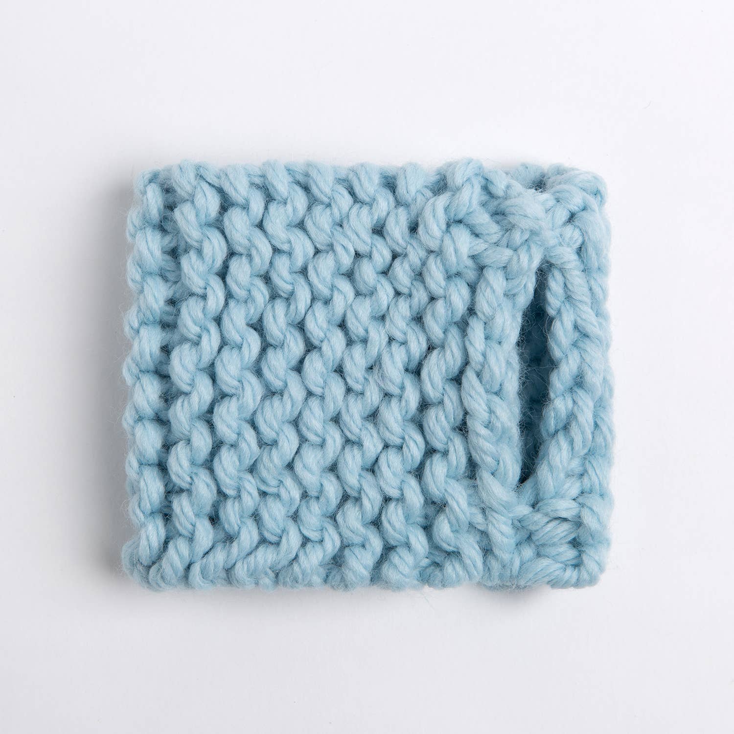 Wool Couture Company light blue chunky hand knit cup cozy with handle slot beginner knitting kit for cup cozy