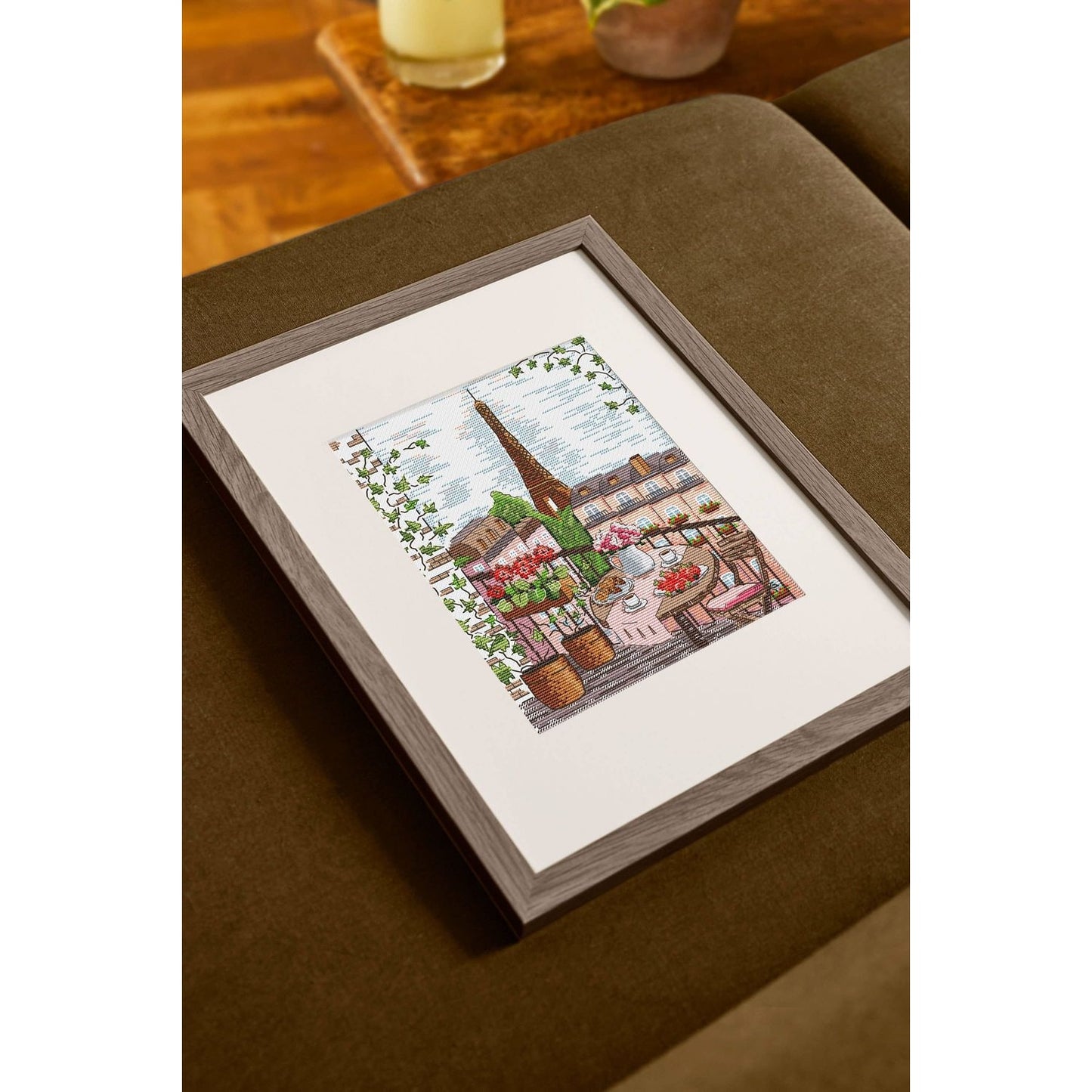 DMC Framed Art Print featuring a charming Parisian scene with the Eiffel Tower Eiffel Tower in the background