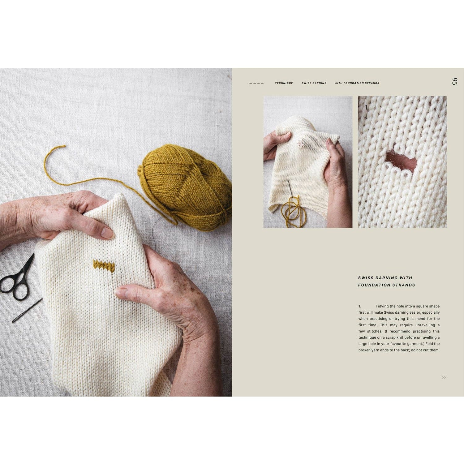 Hands demonstrating Swiss darning technique on a white knitted fabric with yellow yarn and scissors, showcasing knitting kni…