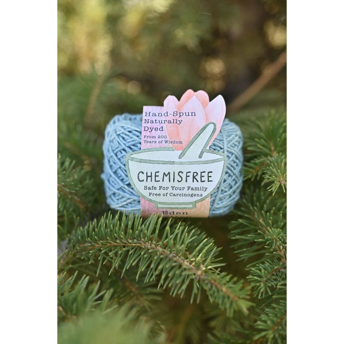 Chemisfree hand-spun naturally dyed yarn in blue, perfect for crafting with cotton fabric