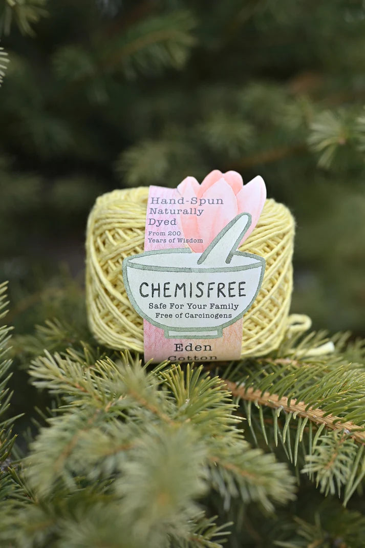 Chemisfree Hand-Spun Naturally Dyed Yarn in Light Green with Cotton Fabric Label for Eco-Friendly Projects