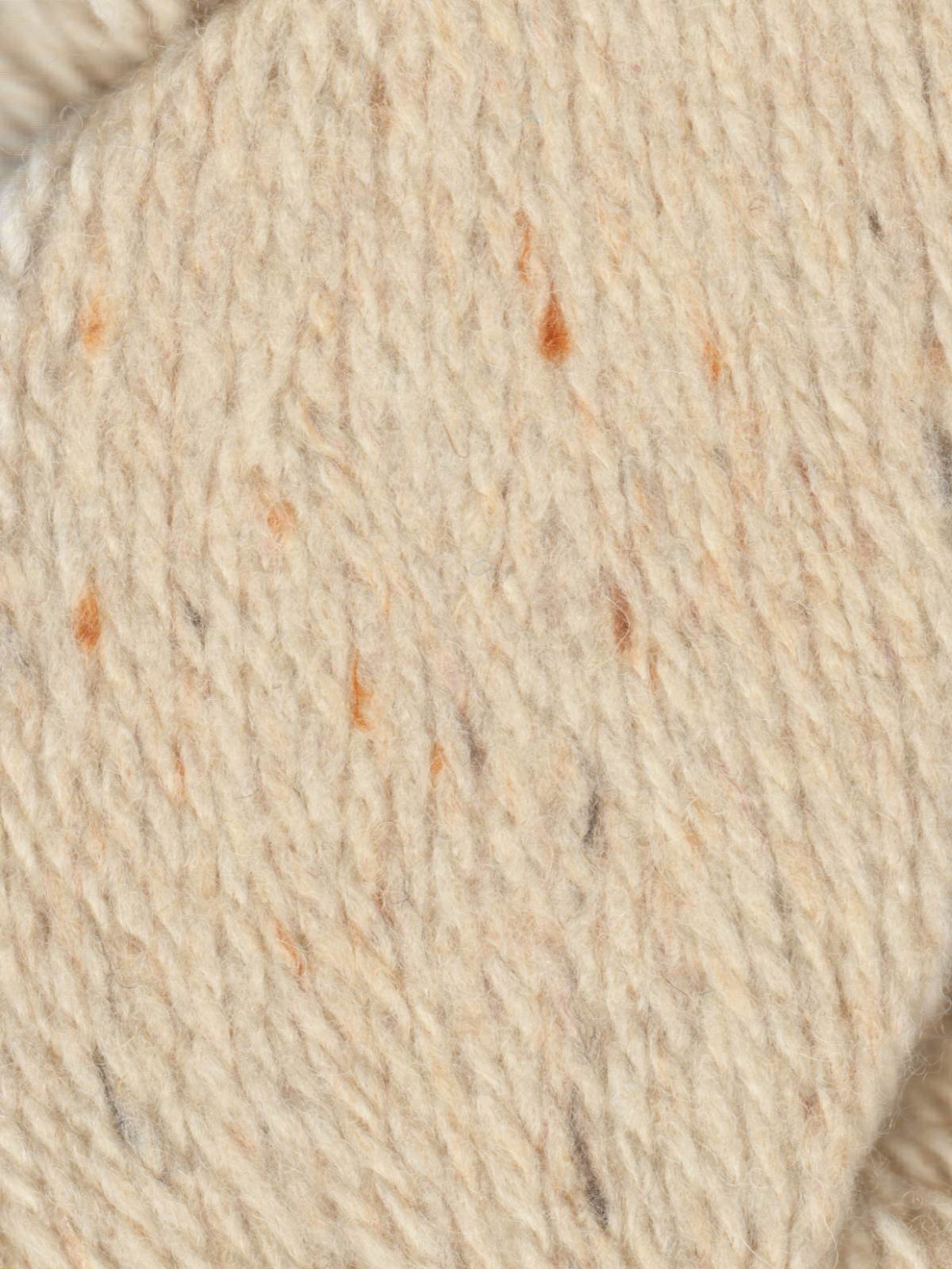 Close-up of Ella Rae Eco Tweed yarn in a light beige color with subtle flecks