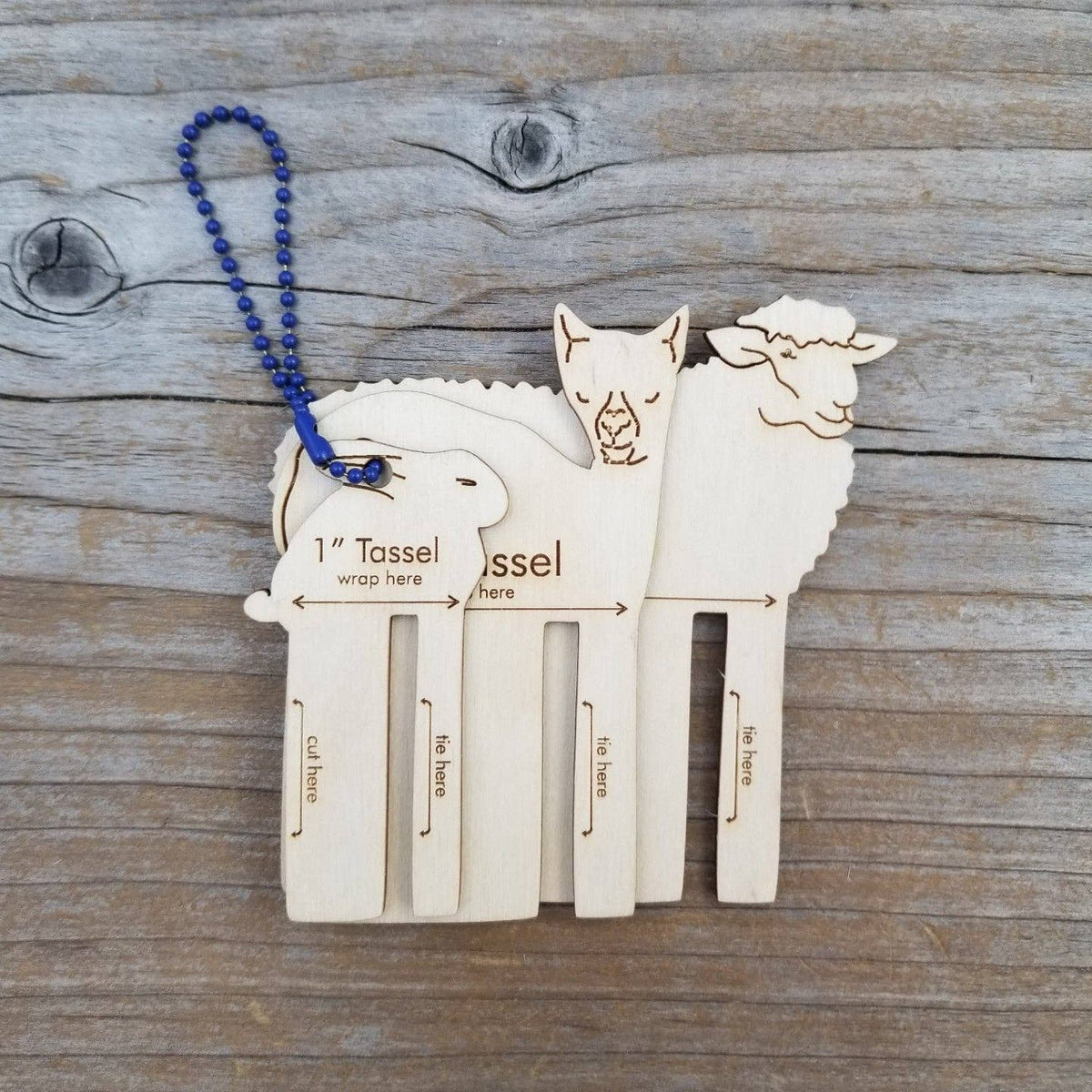 Katrinkles wooden tassel guide featuring sheep and llama shapes for fiber art artists