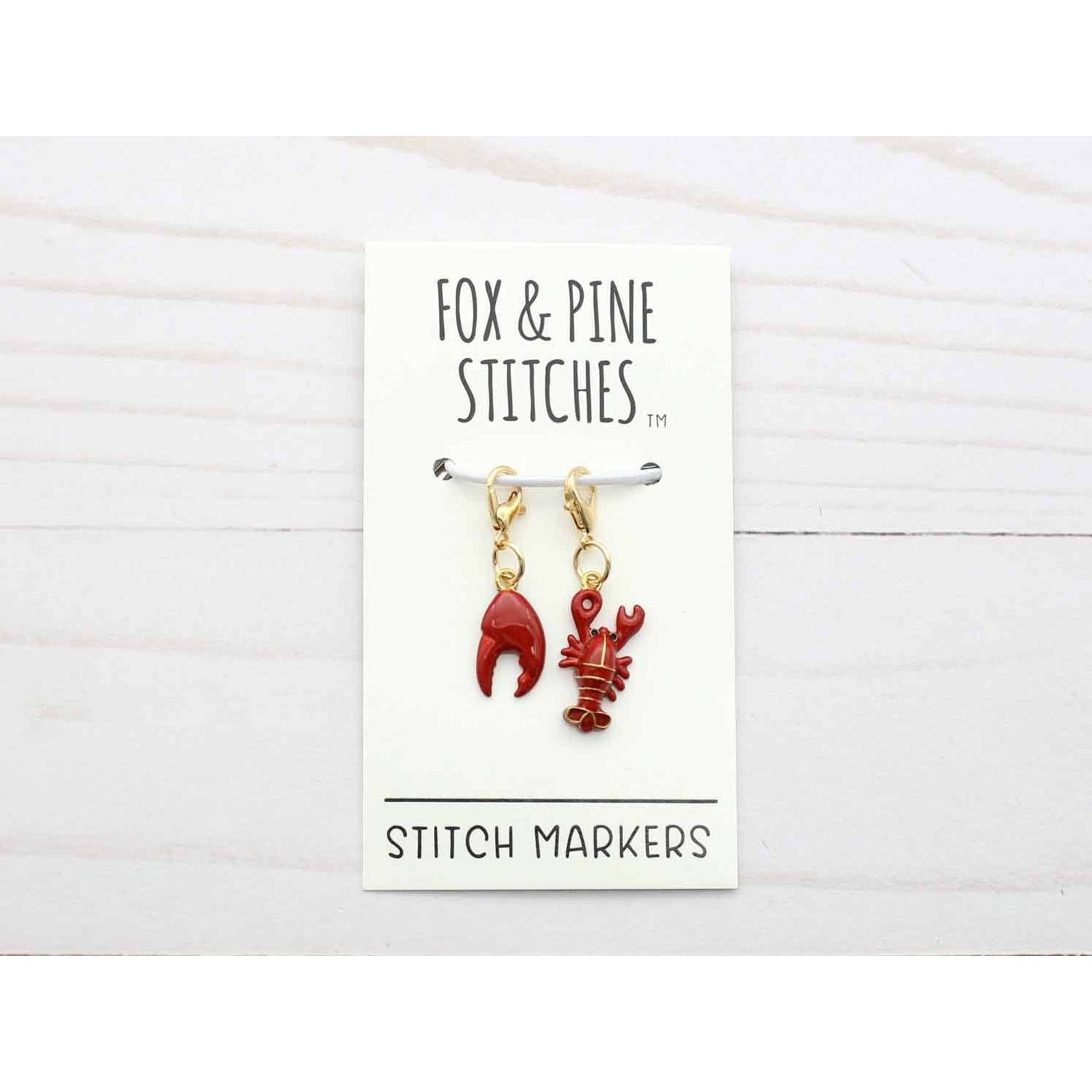 Red lobster stitch markers by Fox & Pine Stitches for knitting and crochet enthusiasts