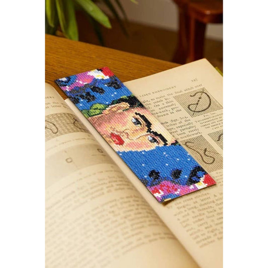 DMC Frida Kahlo artist Cross Stitch Bookmark with Colorful Floral Design on Vintage Book