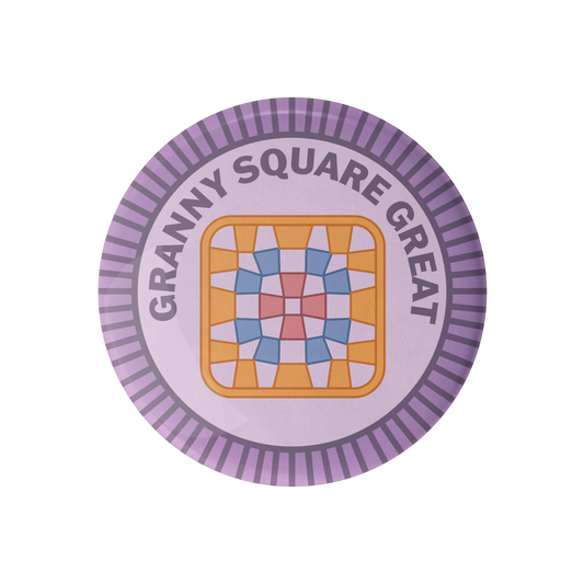 Camp Stitchwood round sticker featuring a square granny square pattern design with colorful shapes