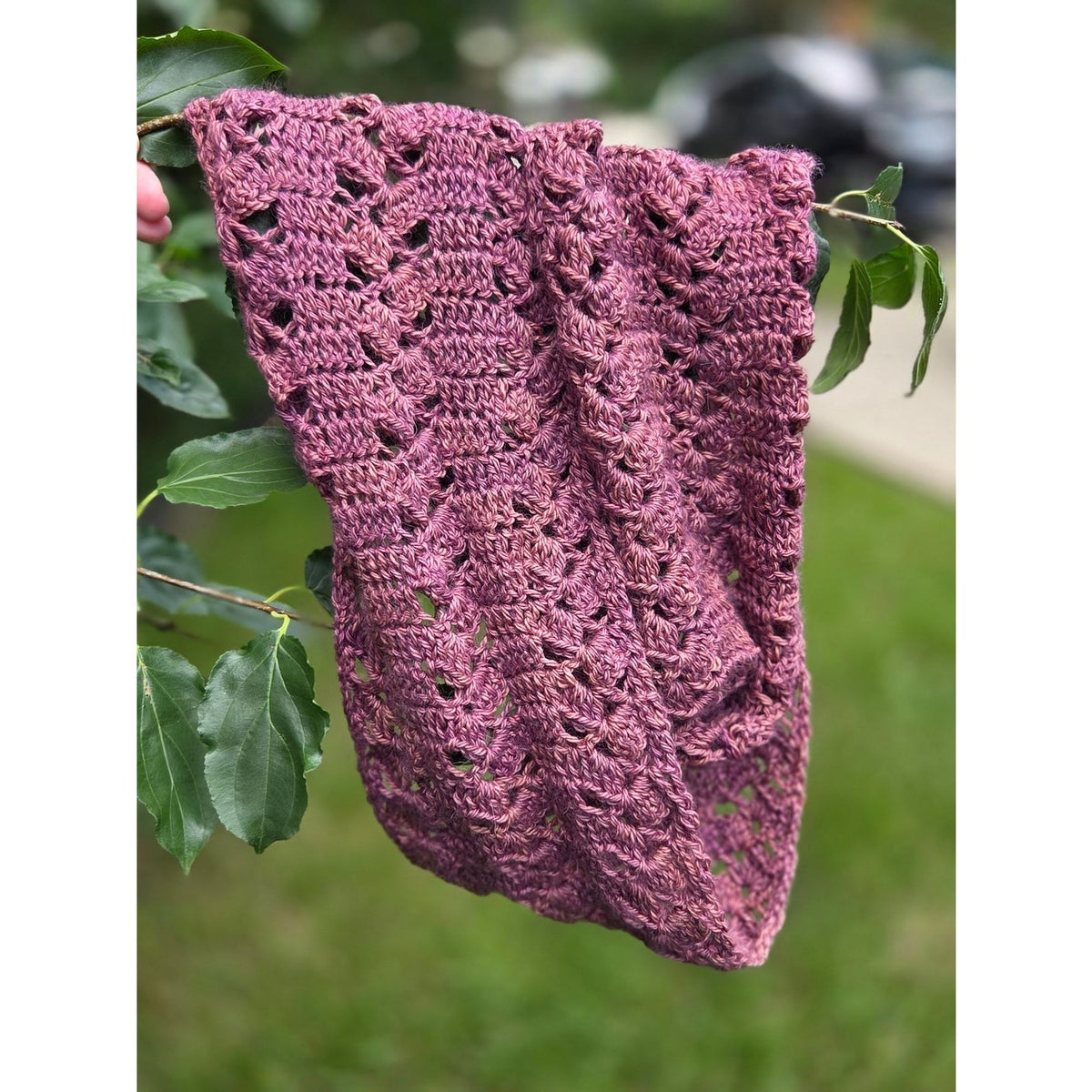 Pink hand crocheted lace infinity scarf with openwork stitch draped on branch lace infinity scarf workshop