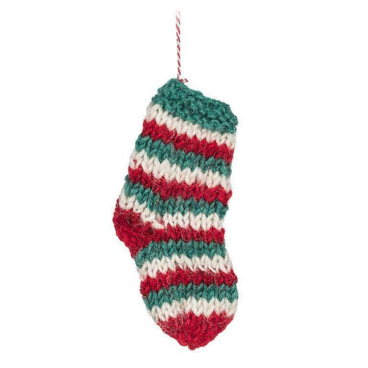 Handmade yarn holiday ornament in red, white, and green striped stocking design