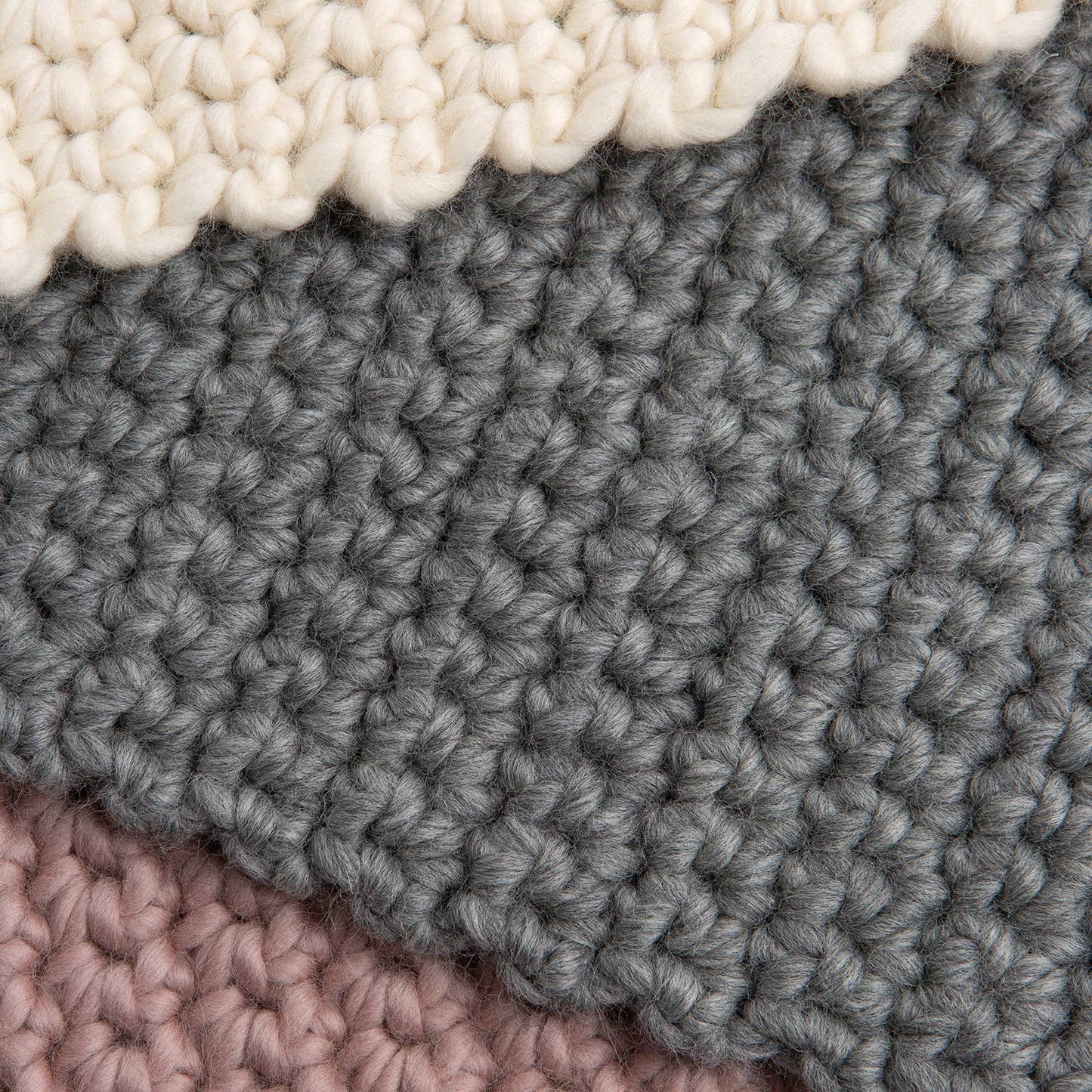 Hannah's crochet kit for beginners chunky soft wool swatch in cream gray and dusty pink showing large crochet stitches