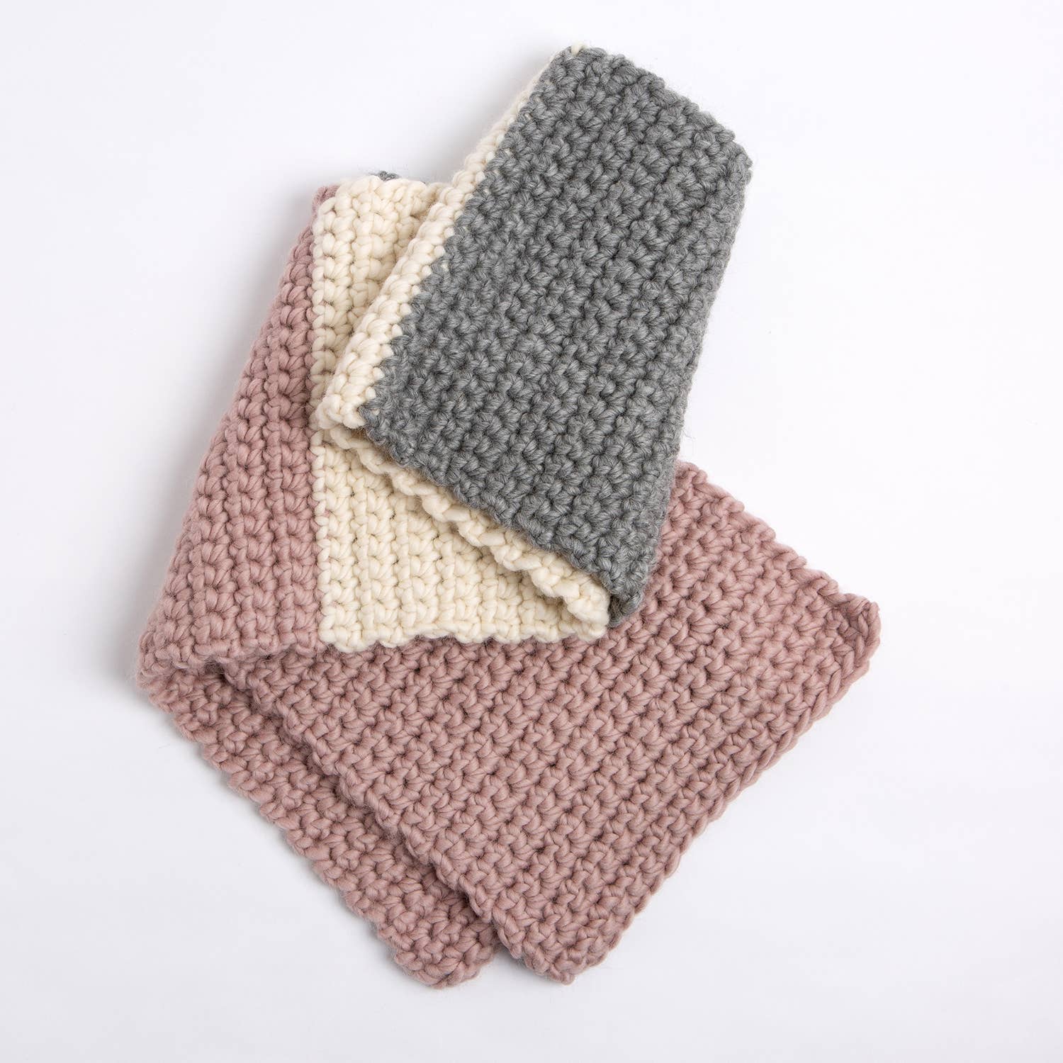 Hannah's crochet kit for beginners chunky scarf set in dusty pink cream and gray showing textured stitches