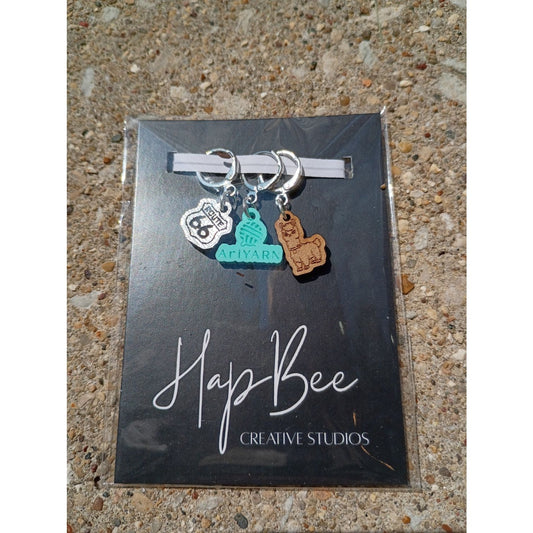 HapBee Creative Studios stitch markers for crocheting featuring a yarn ball and a llama charm