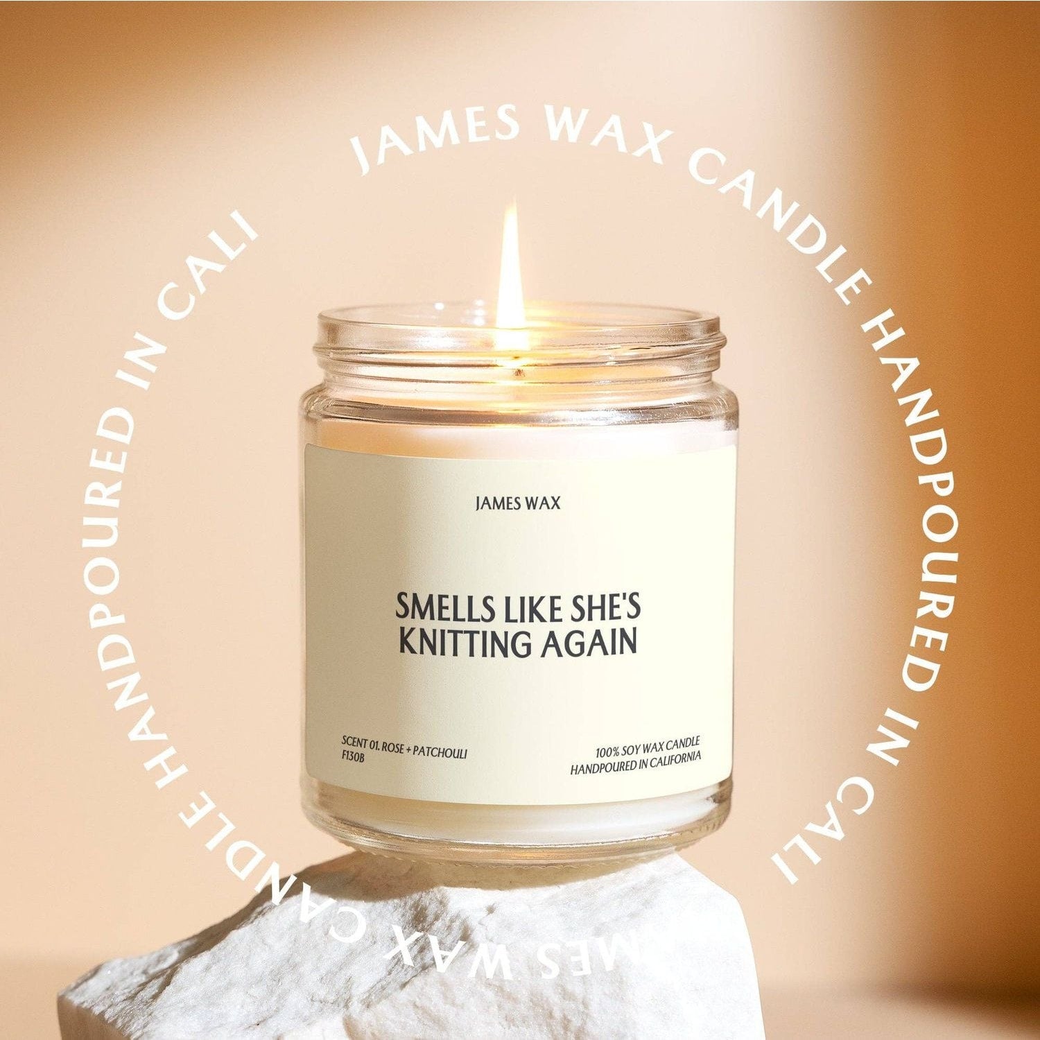 James Wax Smells Like She's Knitting Again Candle, a perfect knitting themed gift candle for crafters