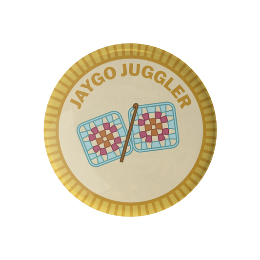 Camp Stitchwood Jaygo Juggler Camp Patch featuring colorful quilted designs and a juggling stick