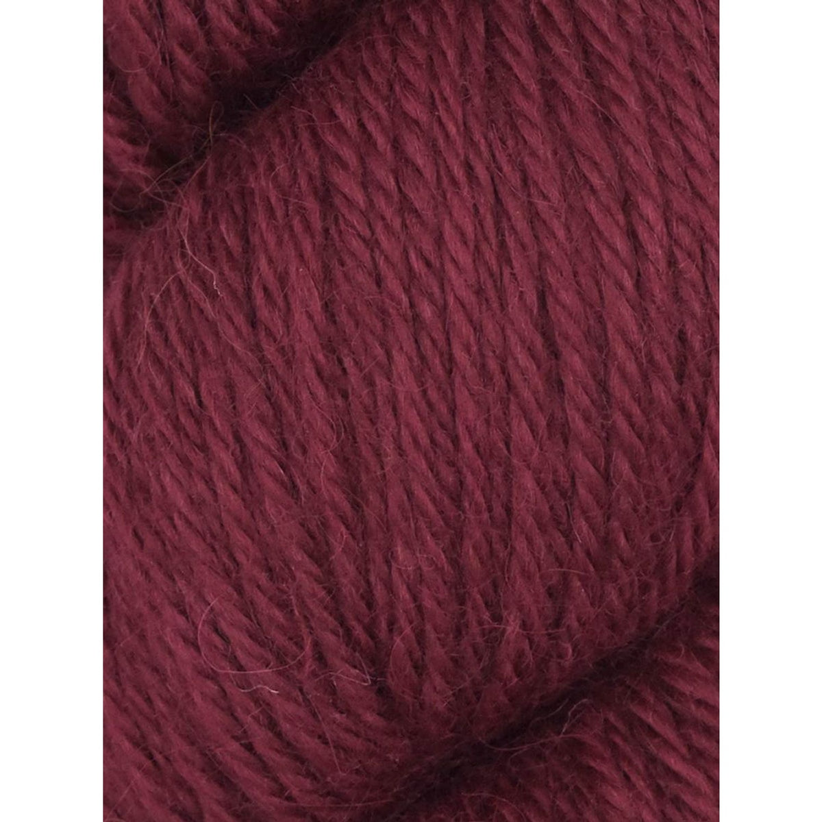 Juniper Moon Farm Herriot yarn in rich burgundy color, perfect for warm knits and cozy garments