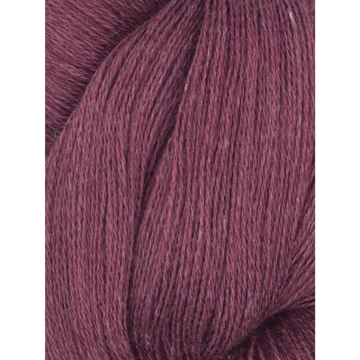 Juniper Moon Farm Herriot yarn in a rich deep purple shade for knitting and crochet projects