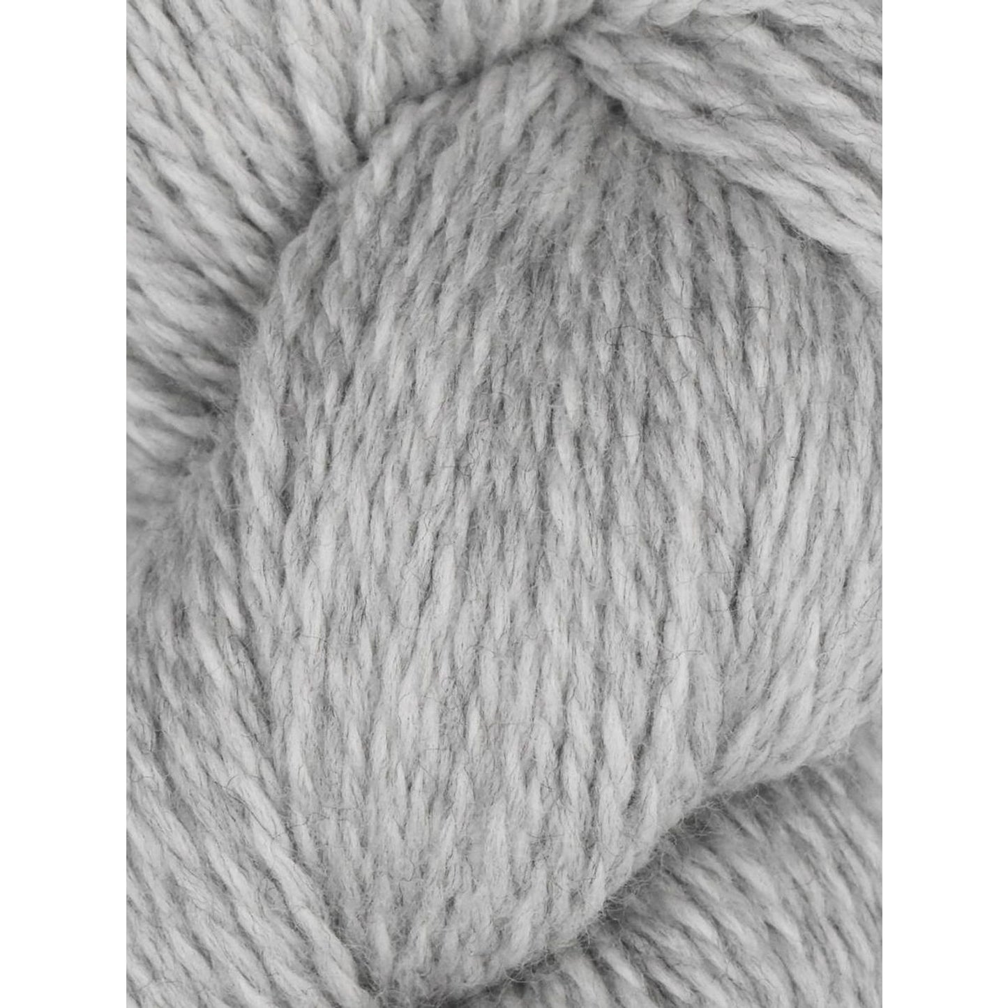 Juniper Moon Farm Rambouillet yarn light gray soft wool skein close up showing texture for cozy knitting projects