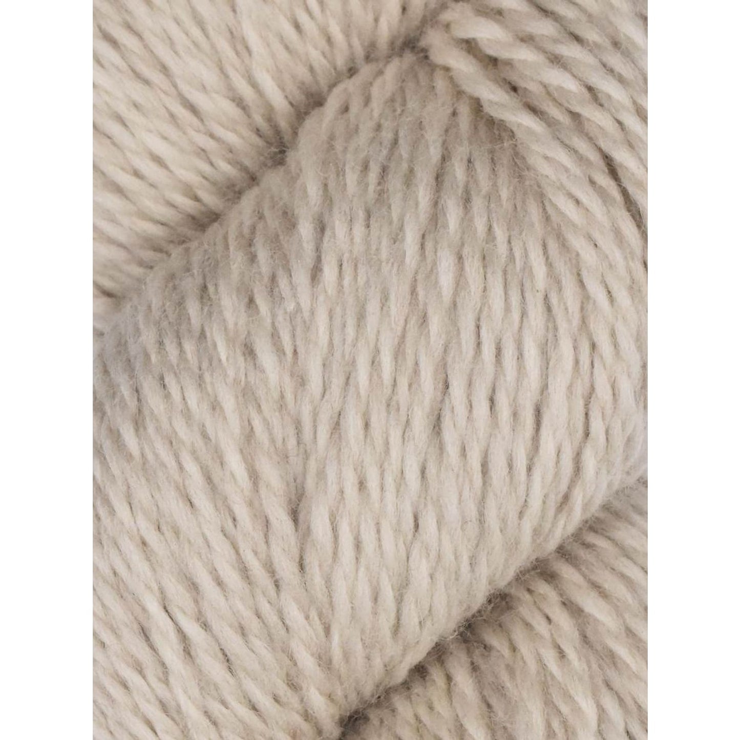 Knitting Fever close up of natural cream skein of Juniper Moon Farm Rambouillet yarn showing soft plied wool texture