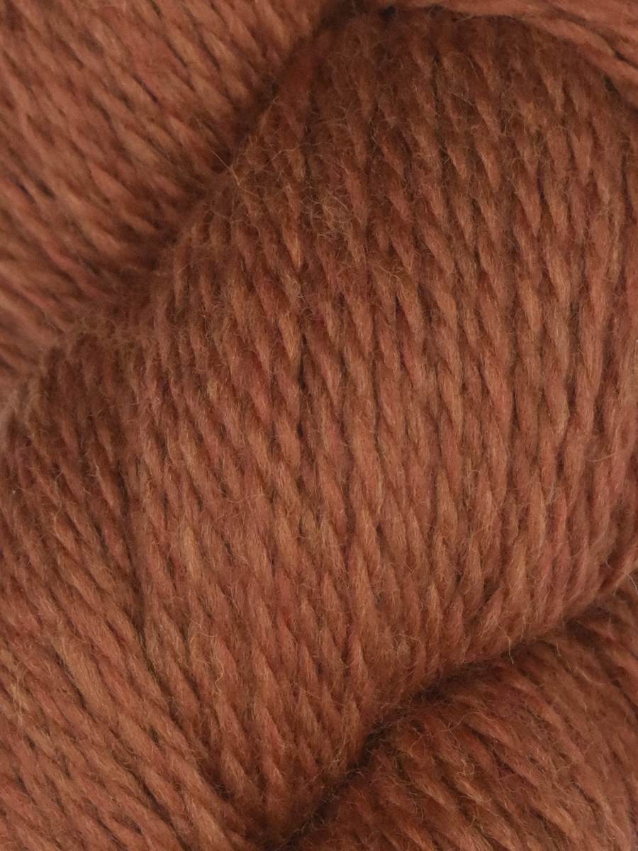 Knitting Fever Juniper Moon Farm Rambouillet yarn rust brown soft wool skein close up for knitting projects