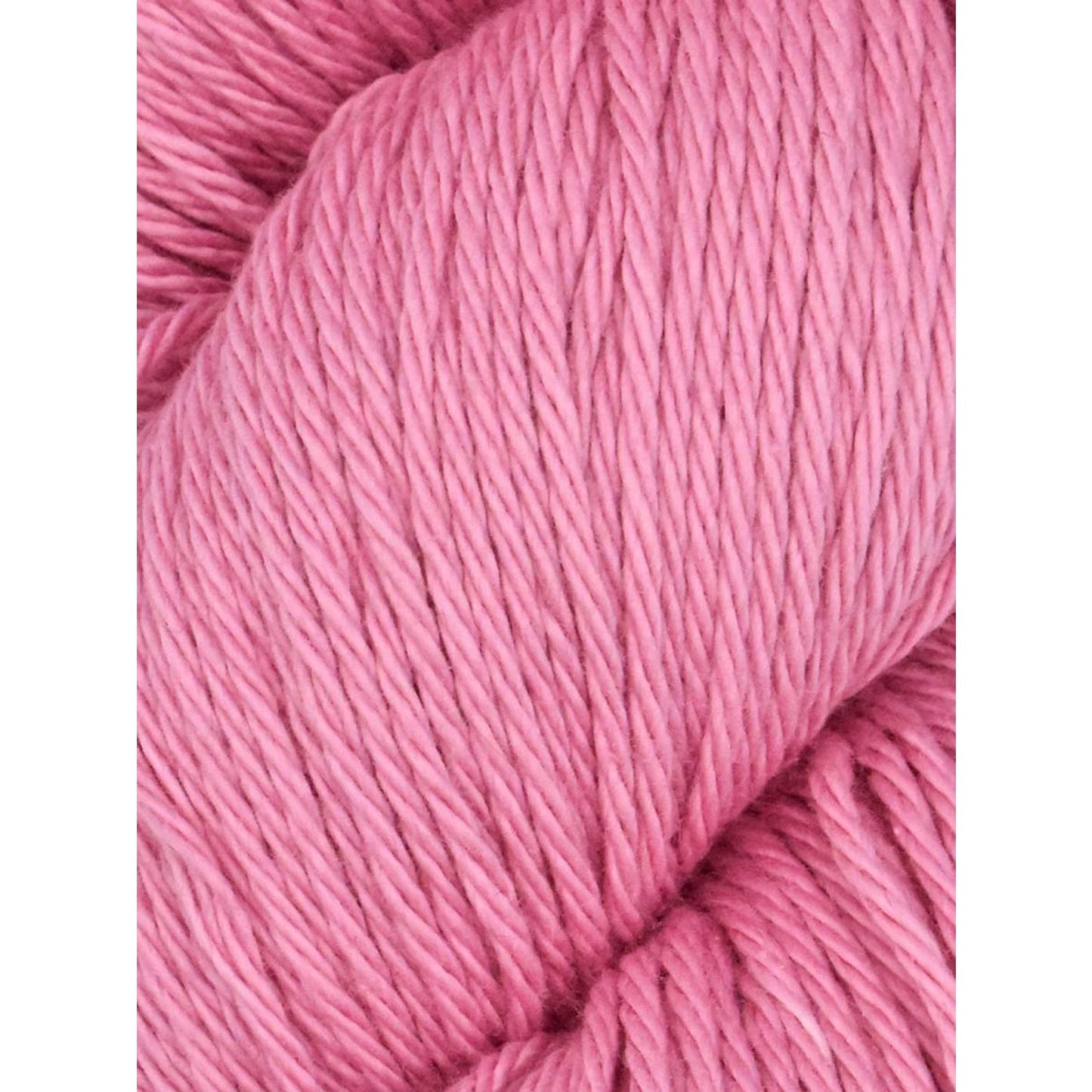 Soft pink yarn from Juniper Moon Farm, perfect for knitting and crafting projects