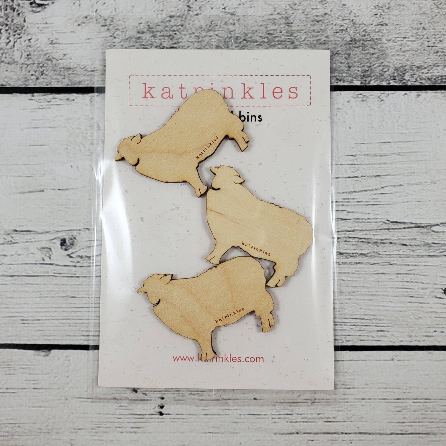 Set of three Katrinkles vintage wooden bobbins shaped like sheep for crafting projects