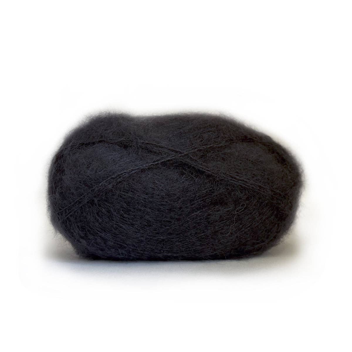Kelbourne Woolens Harmony yarn in dark gray, soft and fluffy for knitting and crocheting projects